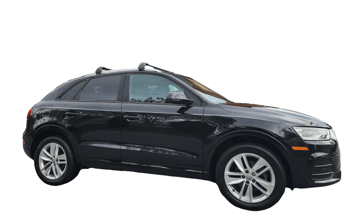 A glossy black Audi Q3 detailed to a clean, even finish by Mr. G's Auto Care in Westminster, MD