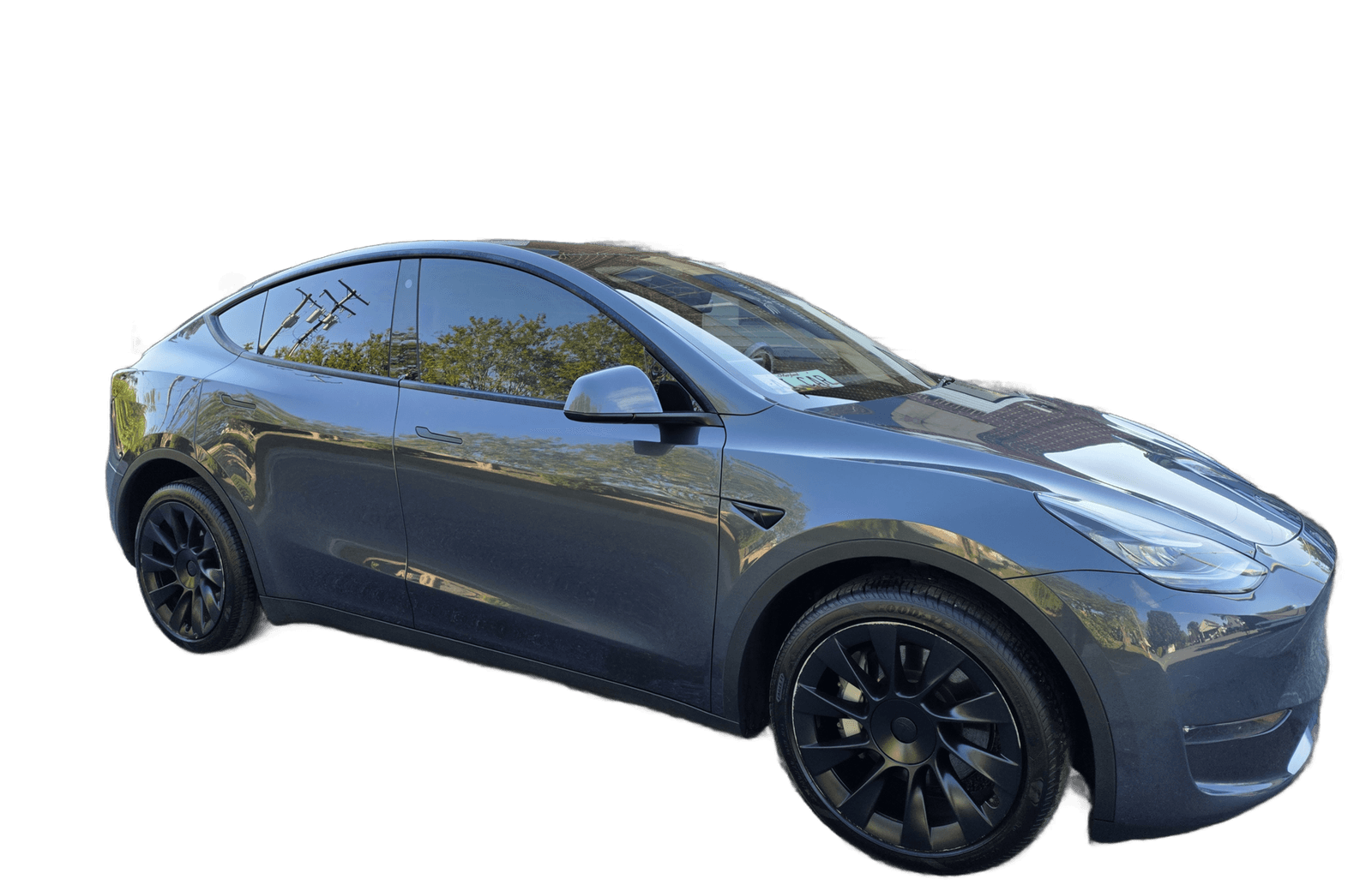 A gray Tesla Model Y detailed to a clean, even gloss by Mr. G's Auto Care in Westminster, MD